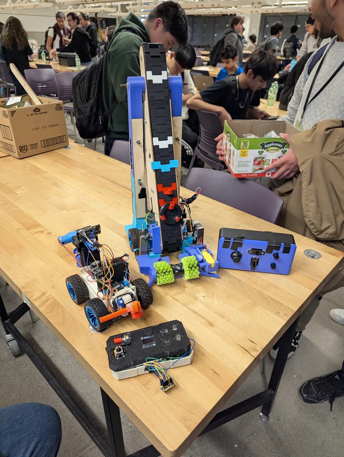 Cameron's MechMania robots and controls on a workbench